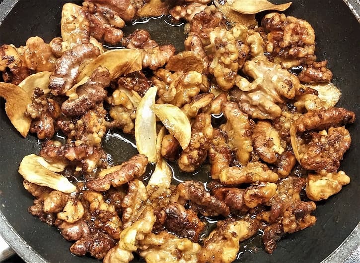 Mustard Garlic Walnut Salad Topping being cooked